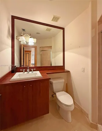 a view of staircase with rug