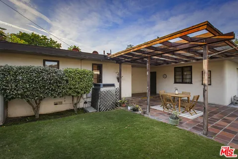 a view of a hall with a fireplace