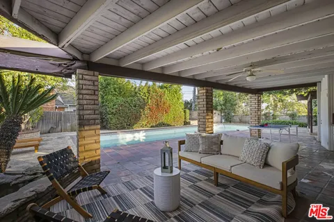 a view of backyard with green space