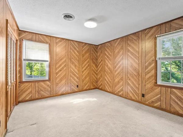 an empty room with windows