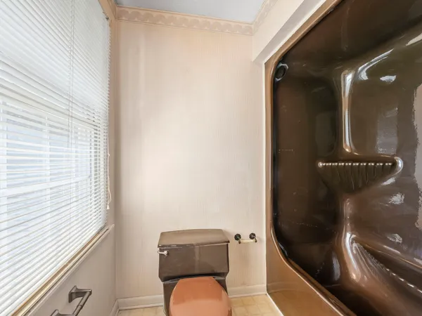 a view of a room with next to a ceiling window