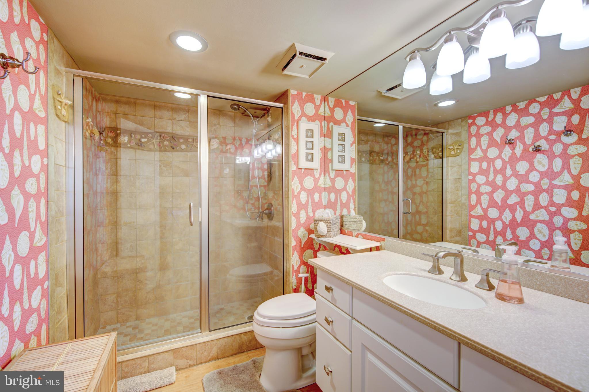 201 South Edgewater House Road, Unit 201S Bethany Beach, DE 19930 - Photo 17 of 50 Master Bath with custom tiled shower...