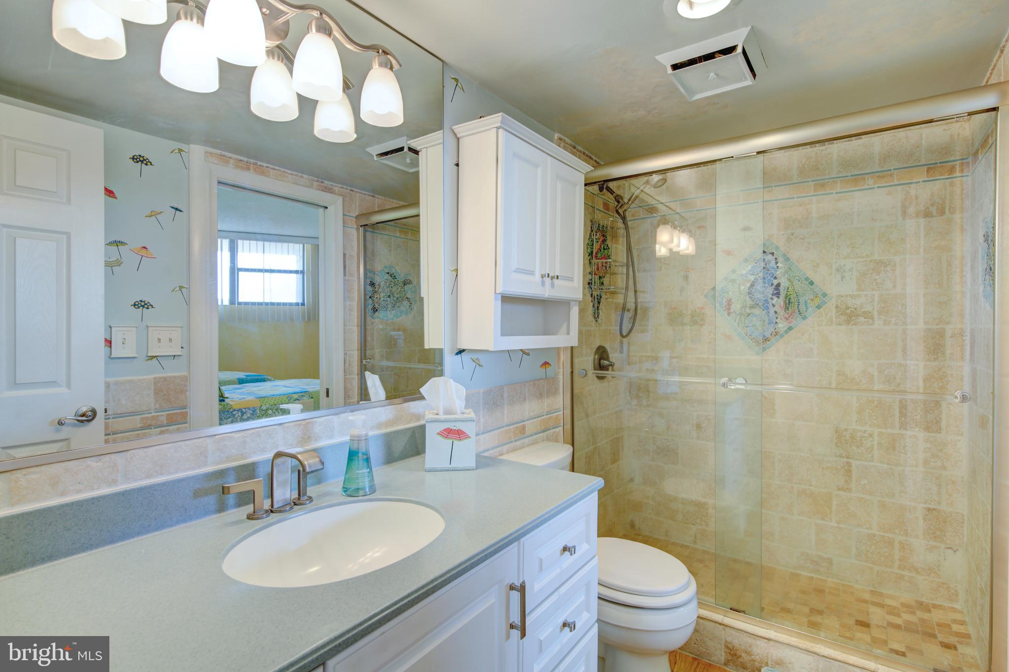 201 South Edgewater House Road, Unit 201S Bethany Beach, DE 19930 - Photo 21 of 50 2nd bath with custom handmade mosaic tile...