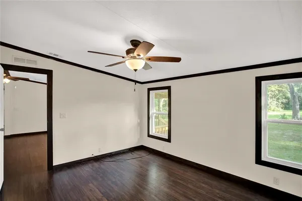 a view of entryway with wooden floor