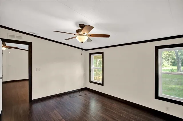 a view of entryway with wooden floor
