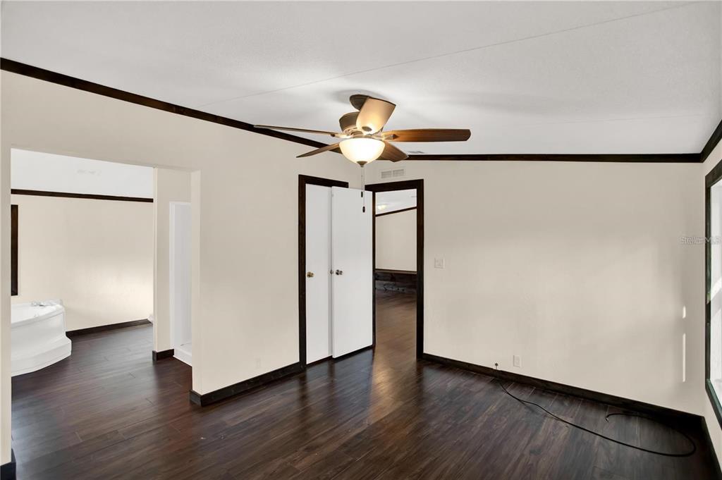 10650 Northwest 190th Street Micanopy, FL 32667 - Photo 13 of 31 a view of entryway with wooden floor