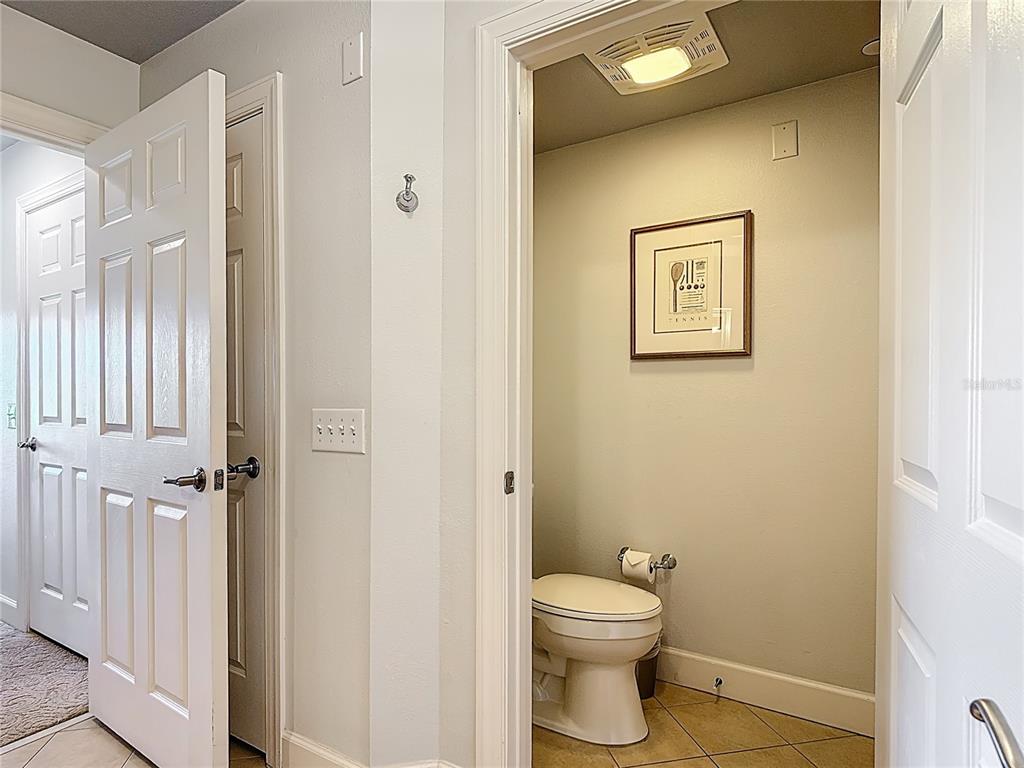 1356 Centre Ct Ridge Drive, Unit 103 Reunion, FL 34747 - Photo 37 of 53 a bathroom with a toilet