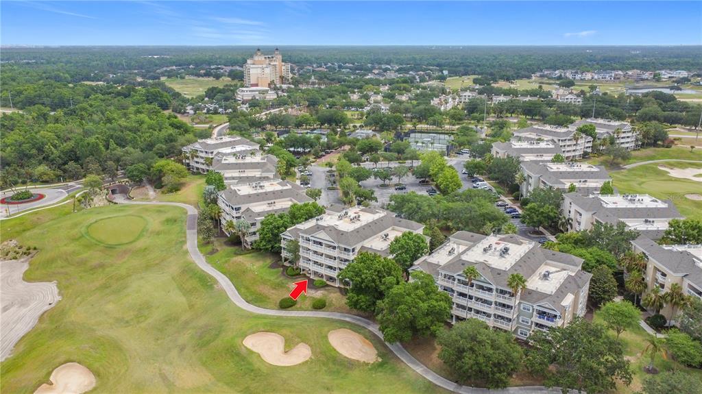 1356 Centre Ct Ridge Drive, Unit 103 Reunion, FL 34747 - Photo 47 of 53 an aerial view of a residential houses with outdoor space and swimming pool