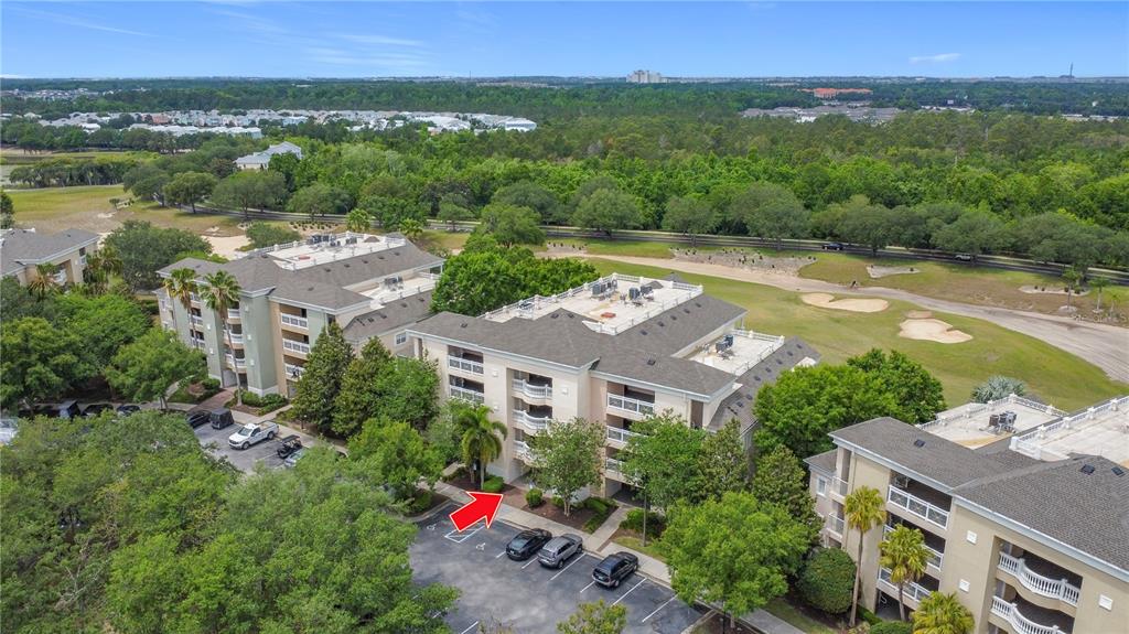 1356 Centre Ct Ridge Drive, Unit 103 Reunion, FL 34747 - Photo 51 of 53 a view of a city with a lake view