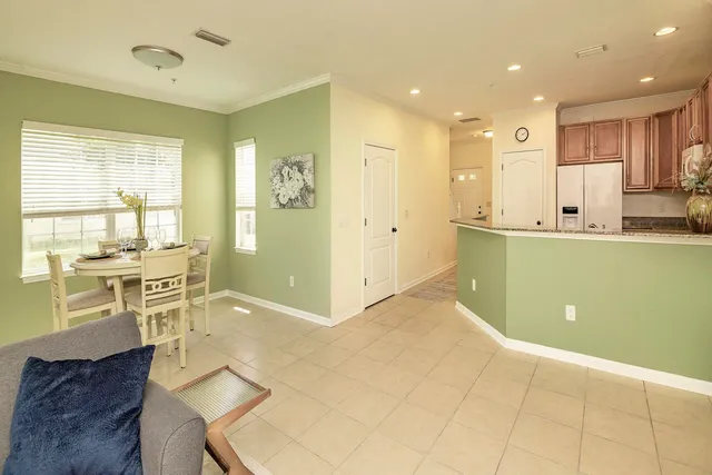 a view of kitchen with cabinets and wooden floor