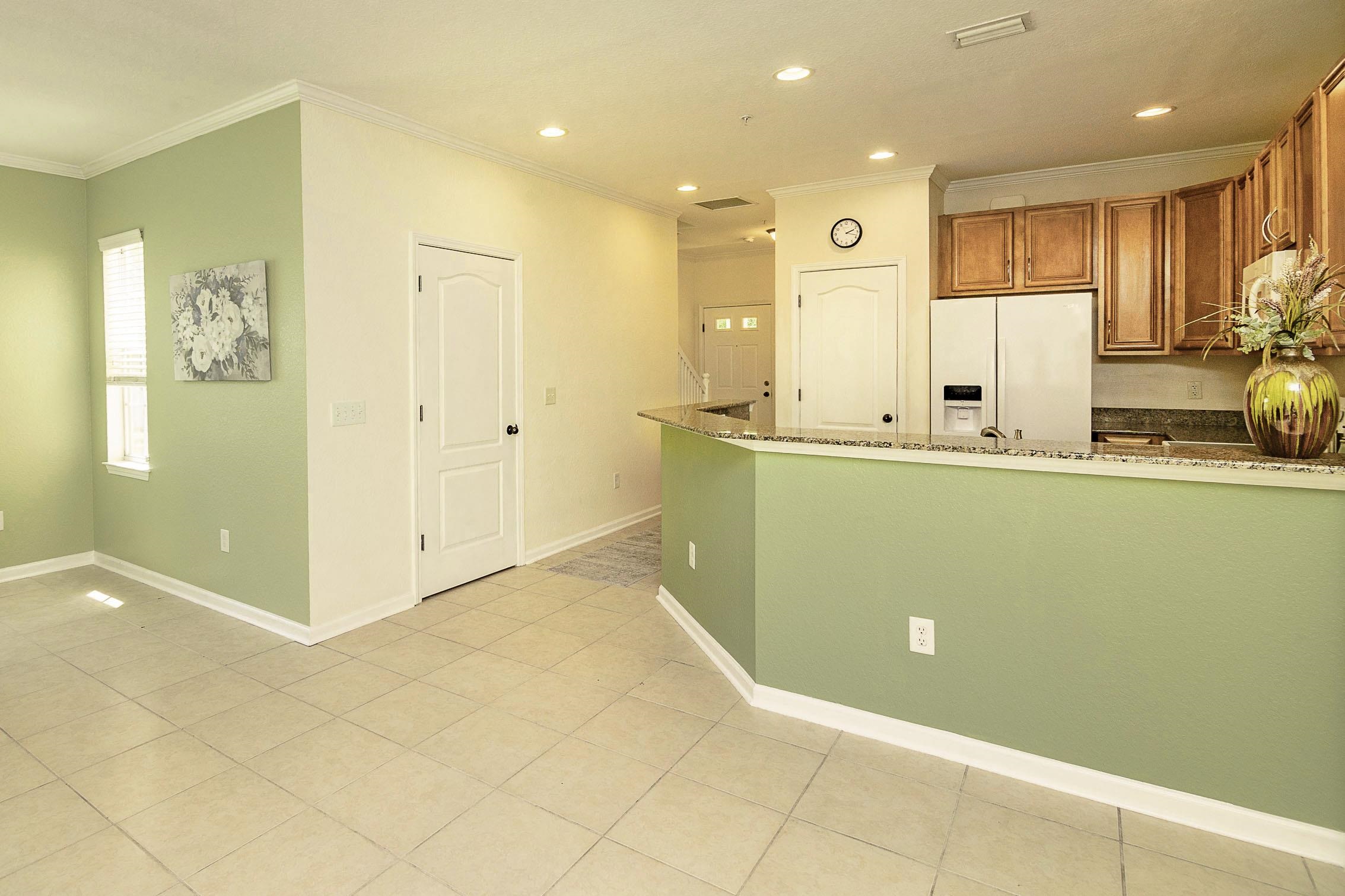 175 Bayberry Circle, Unit 1008 St. Augustine, FL 32086 - Photo 24 of 44 a view of kitchen with stainless steel appliances granite countertop a refrigerator and a sink