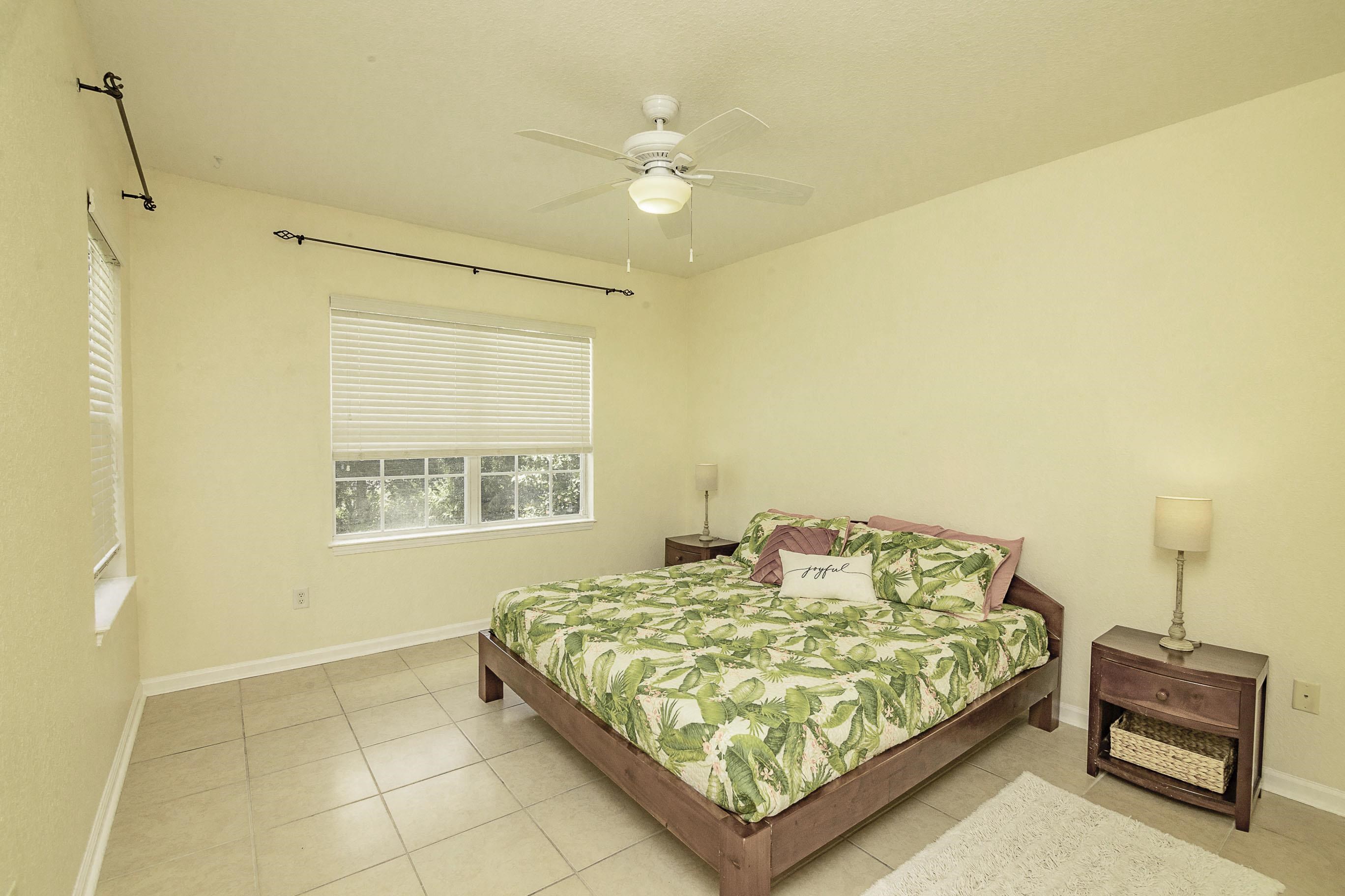 175 Bayberry Circle, Unit 1008 St. Augustine, FL 32086 - Photo 27 of 44 a bedroom with a bed and a window
