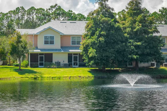 a front view of a house with swimming pool