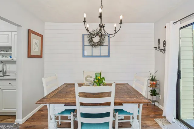 a kitchen with a sink cabinets and stainless steel appliances