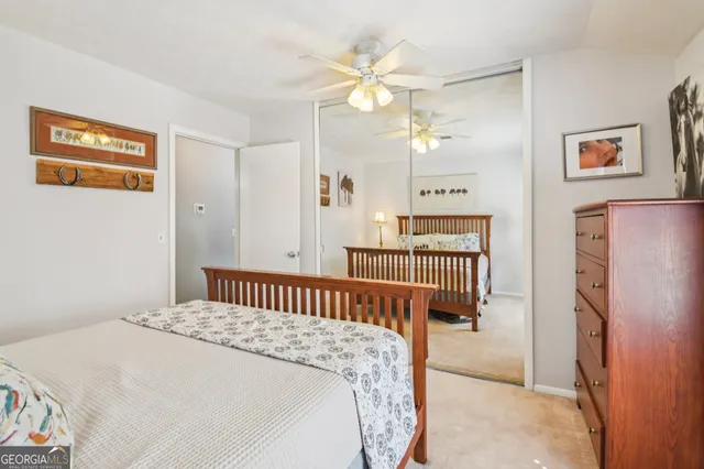 a view of a house with a tree