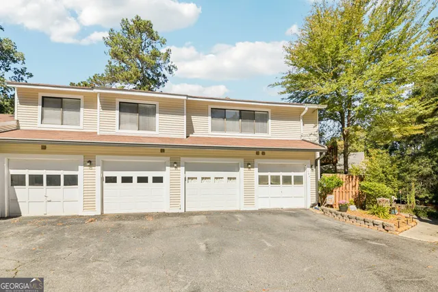 a front view of a building with a street