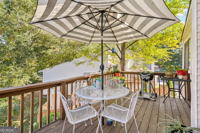 a view of a balcony with furniture