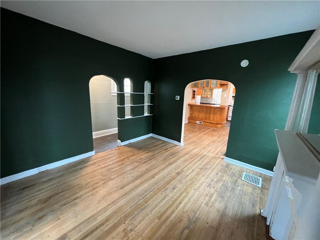300 Grove Street McKees Rocks, PA 15136 - Photo 8 of 25 a view of a livingroom with wooden floor