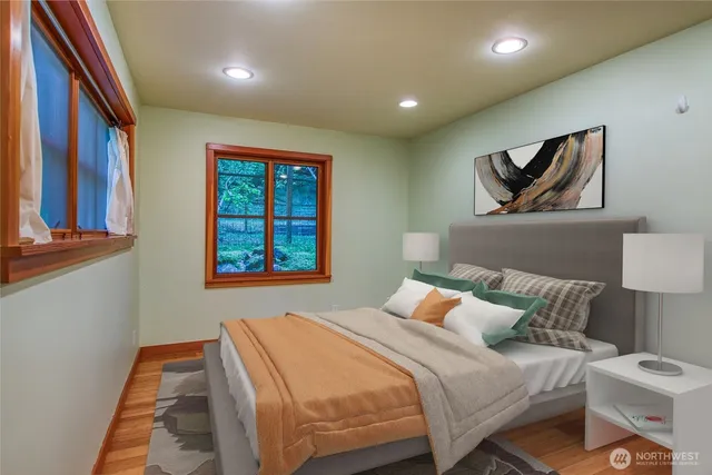 a bathroom with a toilet sink and shower