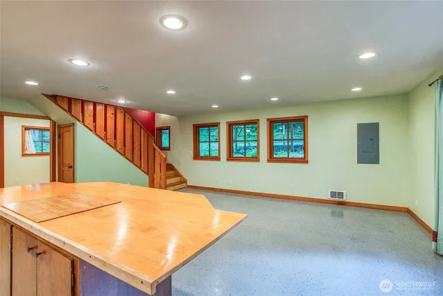 a view of an entryway with a kitchen