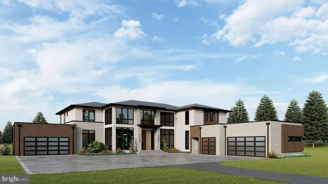 a front view of residential houses with yard and green space