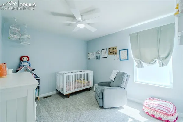 a room with furniture and a window