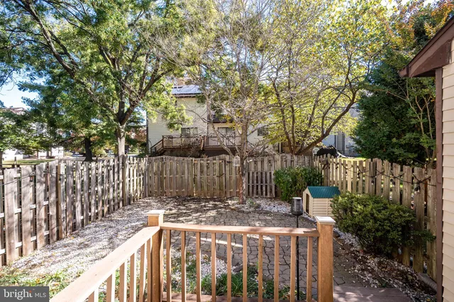 a view of street with a house