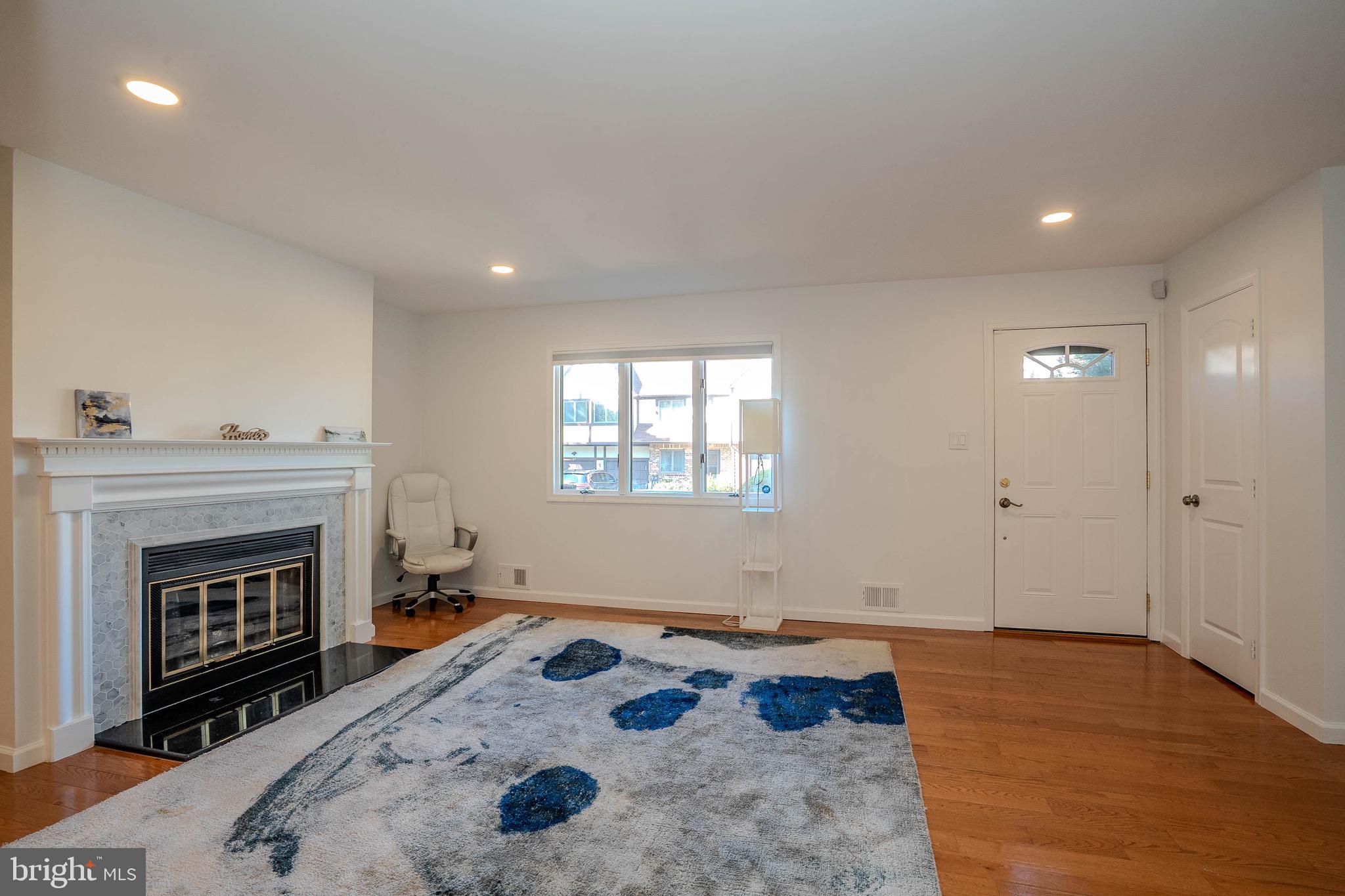 5 Balamor Lane Ewing, NJ 08628 - Photo 5 of 29 a living room with furniture and a fireplace