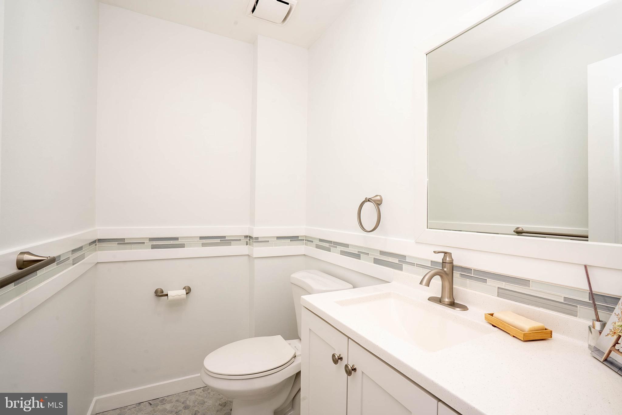 5 Balamor Lane Ewing, NJ 08628 - Photo 9 of 29 a bathroom with a sink a toilet and shower