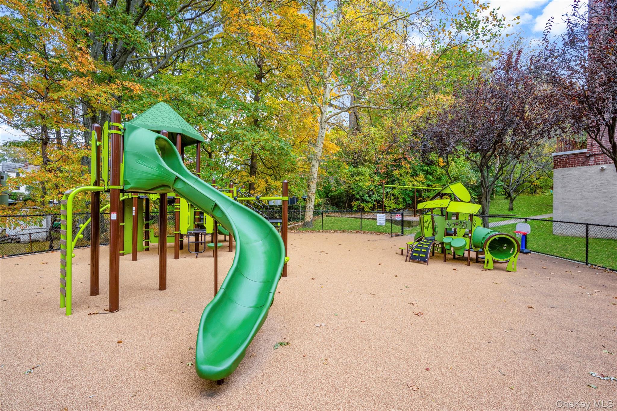 325 Palmer Terrace, Unit 2C Mamaroneck, NY 10543 - Photo 17 of 18 a view of a park with slide