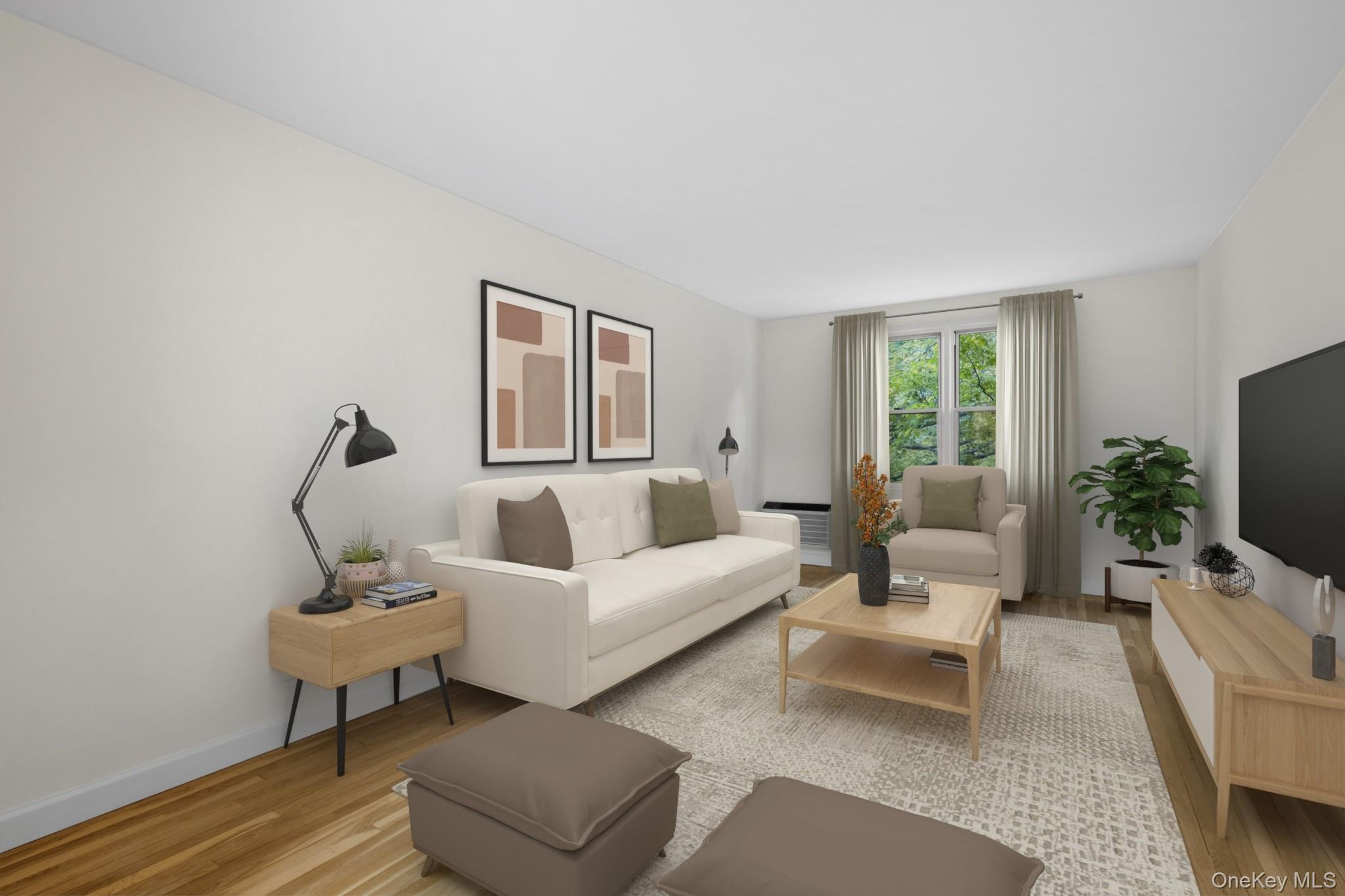 325 Palmer Terrace, Unit 2C Mamaroneck, NY 10543 - Photo 7 of 18 a living room with furniture and a flat screen tv