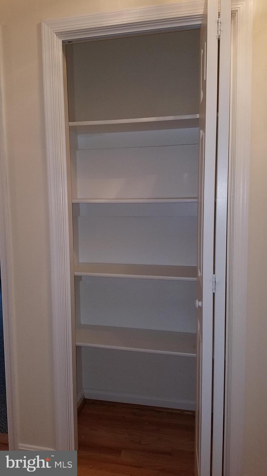 108 Finch Lane Falling Waters, WV 25419 - Photo 28 of 33 a view of walk in closet with empty racks