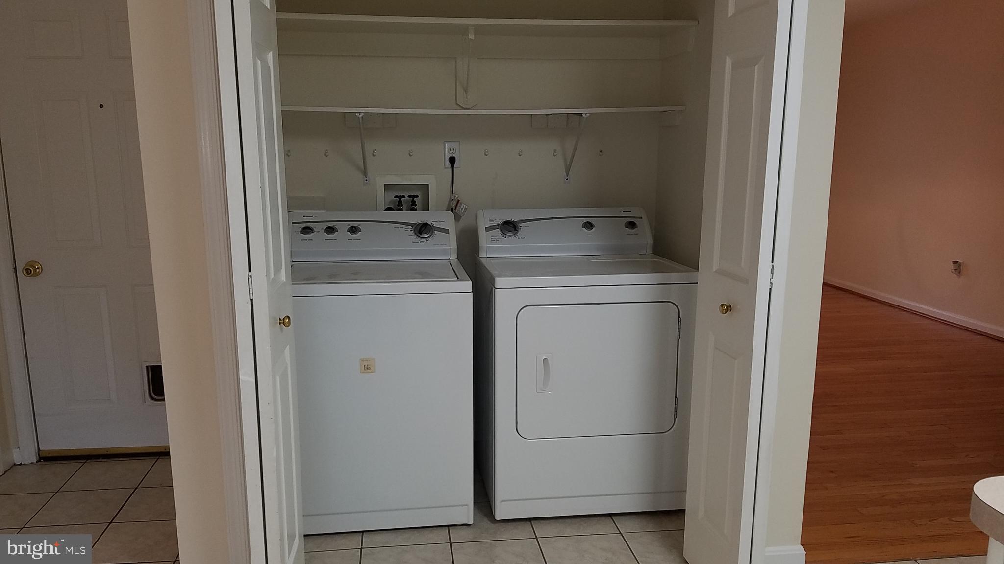 108 Finch Lane Falling Waters, WV 25419 - Photo 29 of 33 a utility room with dryer and washer