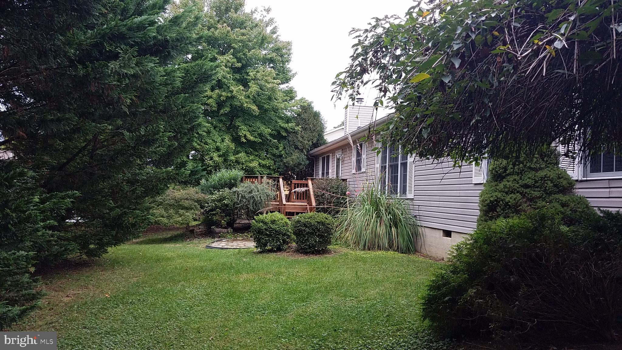 108 Finch Lane Falling Waters, WV 25419 - Photo 4 of 33 a view of a back yard