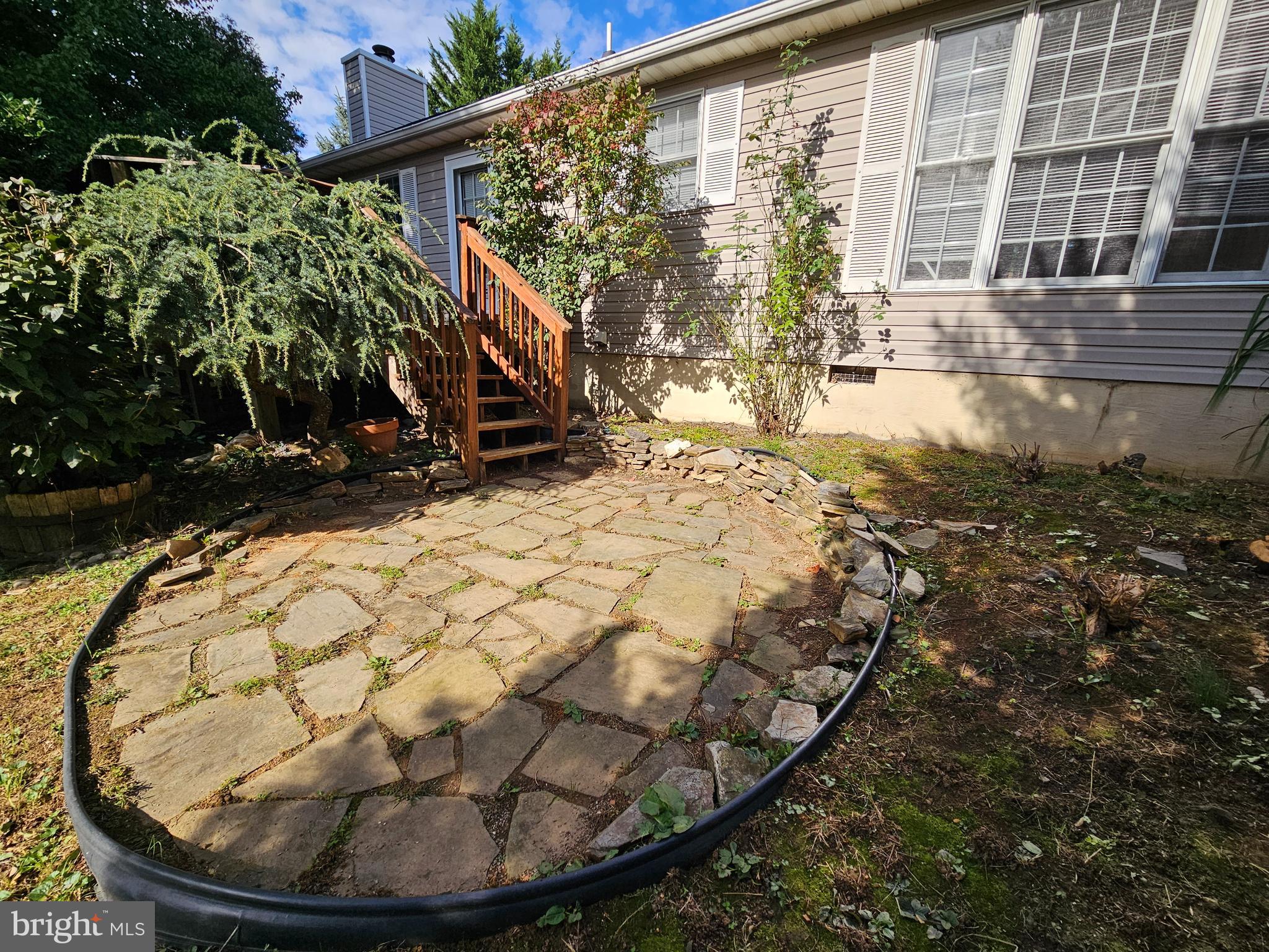 108 Finch Lane Falling Waters, WV 25419 - Photo 7 of 33 a view of a backyard with fountain