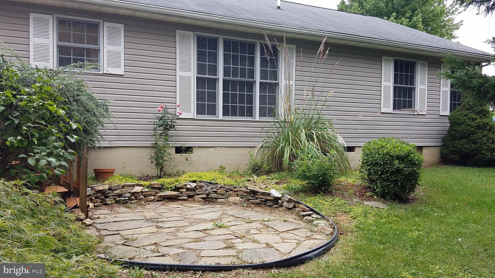 108 Finch Lane Falling Waters, WV 25419 - Photo 9 of 33 a view of a house with a backyard