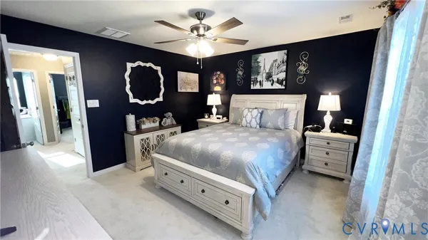 a view of a hallway to a bedroom