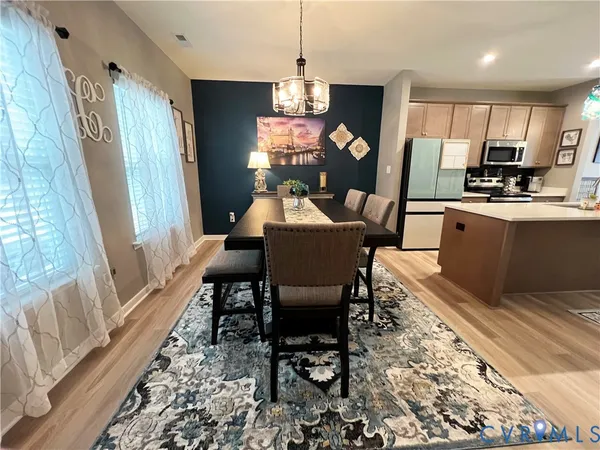 a view of a dining room with furniture
