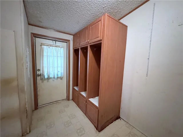 a dining room with furniture a rug and wooden floor