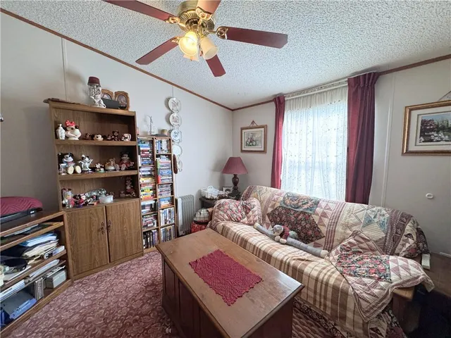 a view of a workspace with furniture