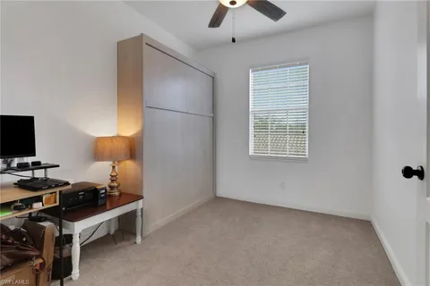 a room with furniture and a window