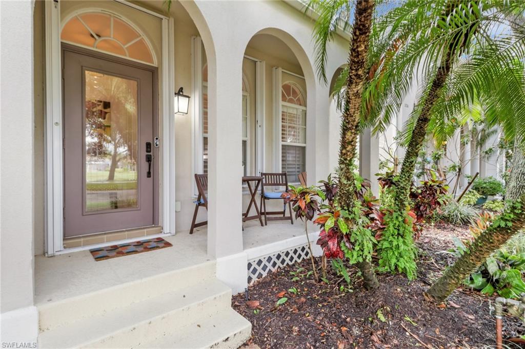 3570 Zanzibar Way Naples, FL 34119 - Photo 2 of 43 a view of front door of house