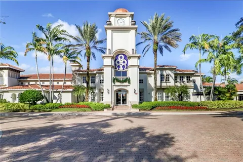 a view of multiple houses with a street