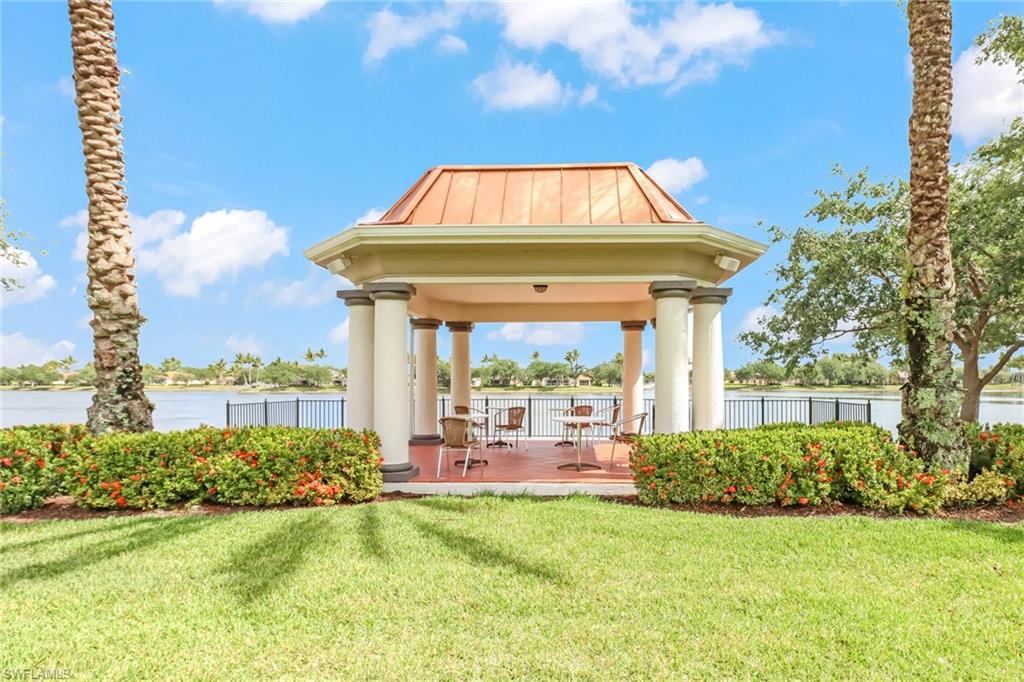 3570 Zanzibar Way Naples, FL 34119 - Photo 31 of 43 a view of a garden with a patio