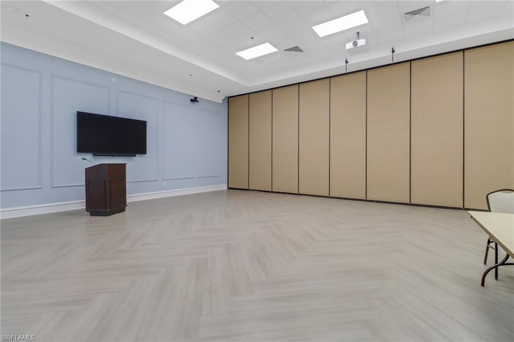 3570 Zanzibar Way Naples, FL 34119 - Photo 41 of 43 a view of an empty room with a tv