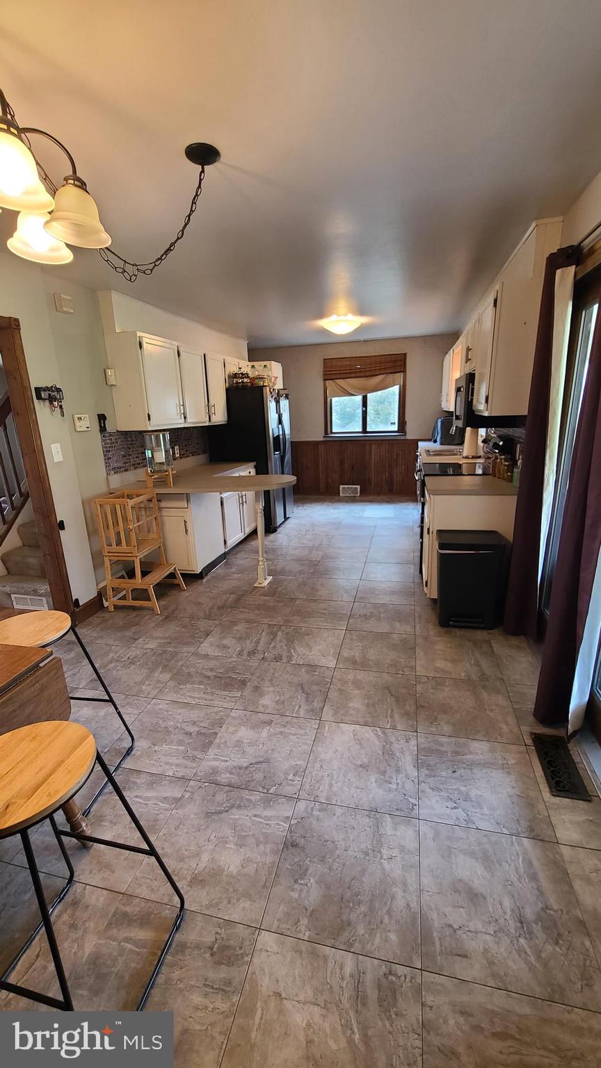 302 Valley Road Enola, PA 17025 - Photo 8 of 35 Eat in Kitchen with access to screened porch