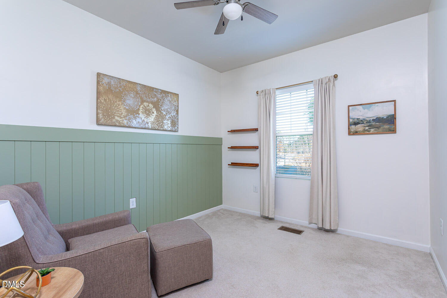 6197 Beale Loop Raleigh, NC 27616 - Photo 12 of 20 a room with furniture and a ceiling fan