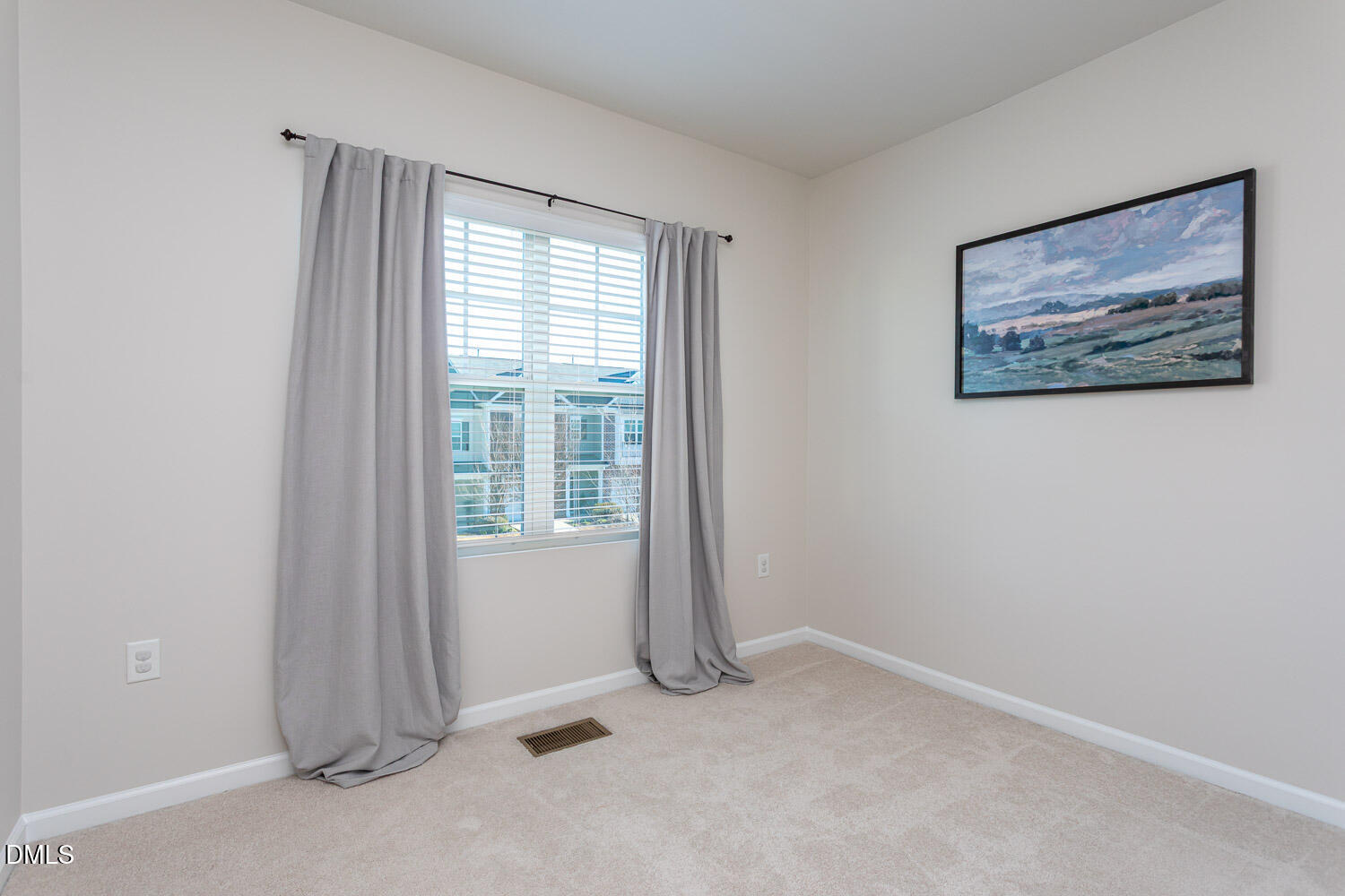 6197 Beale Loop Raleigh, NC 27616 - Photo 14 of 20 an empty room with windows