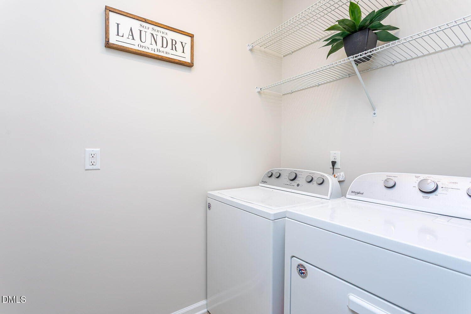 6197 Beale Loop Raleigh, NC 27616 - Photo 15 of 20 a utility room with dryer and washer