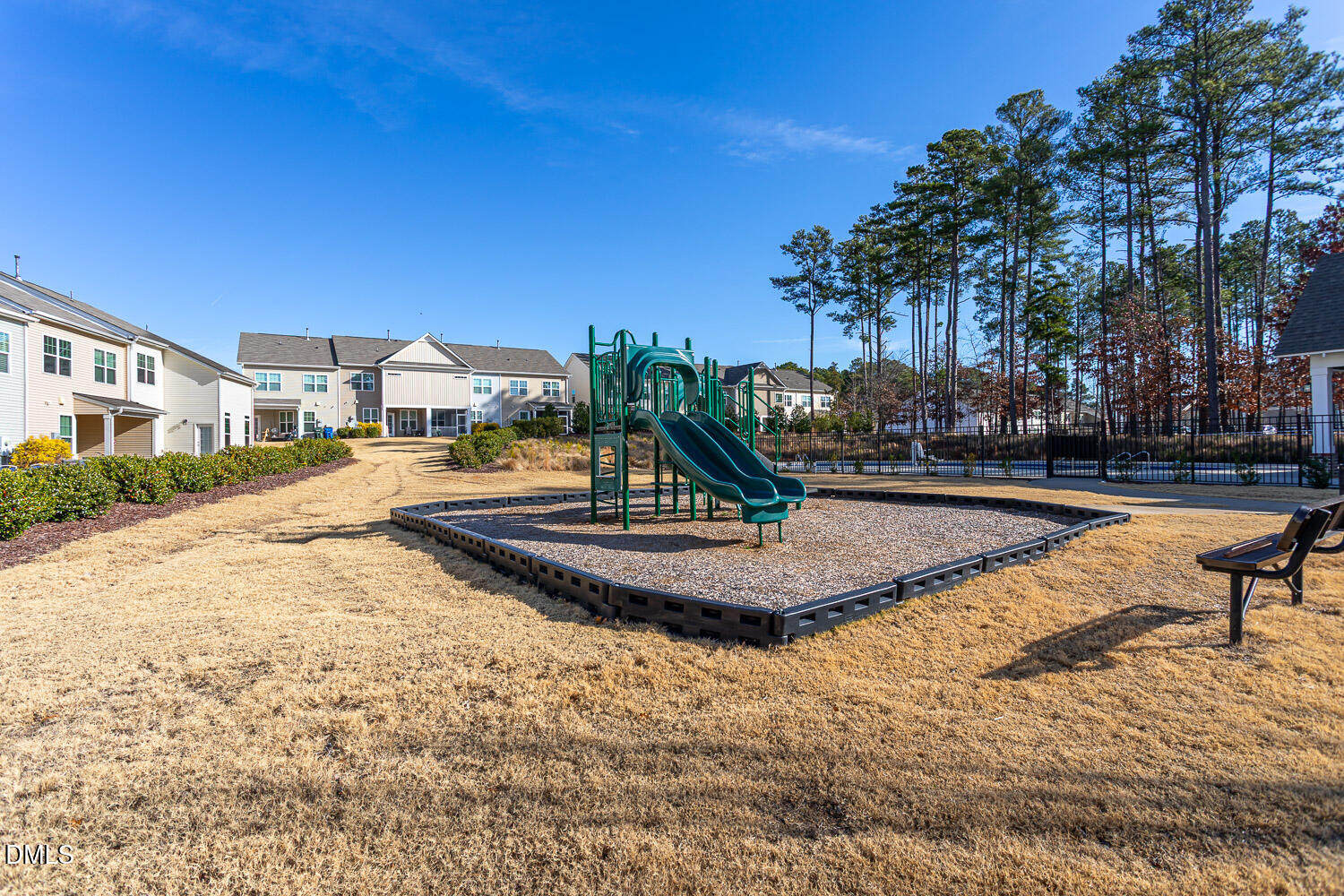 6197 Beale Loop Raleigh, NC 27616 - Photo 19 of 20 a view of a swimming pool with a yard